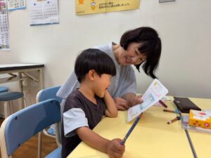 先生と取り組む様子